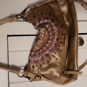 Desigual gold and cream handbag w cut out pattern.